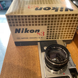 Nikon S3 35mm rangefinder camera with black Nikkor f1.4 5cm lens, cap and box