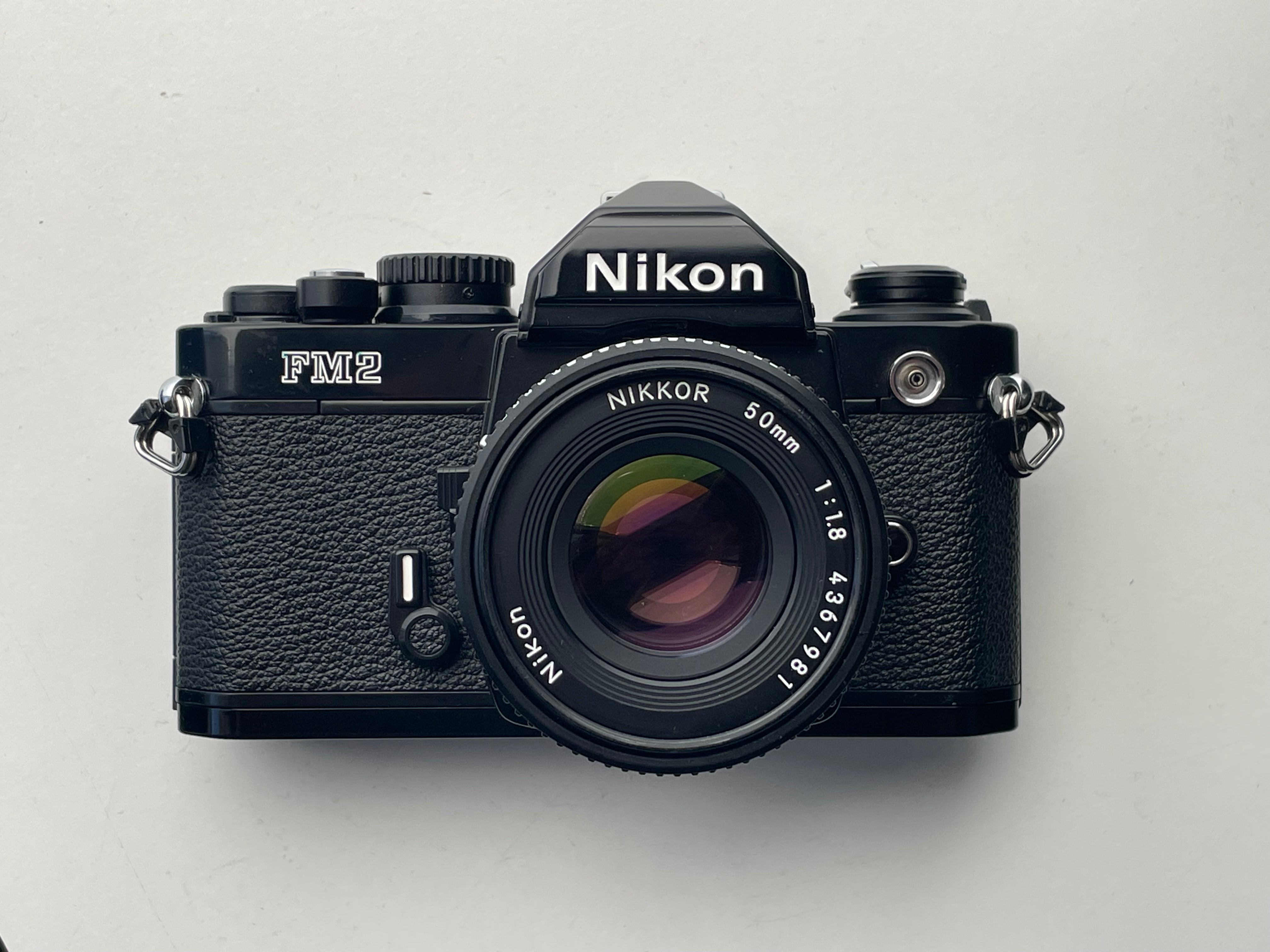 Nikon ニコン FM2 ブラック + NIKKOR 50mm F1.8 File:Nikon FM2 et Nikkor 50mm f1.8.jpg - Wikimedia Commons